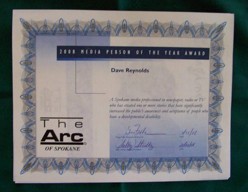 blue text on white certificate, "2008 Media Person of the Year Award, Dave Reynolds"